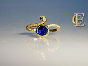 Ring, 750/000 Gelbgold mit blauen Saphiren und Brillanten